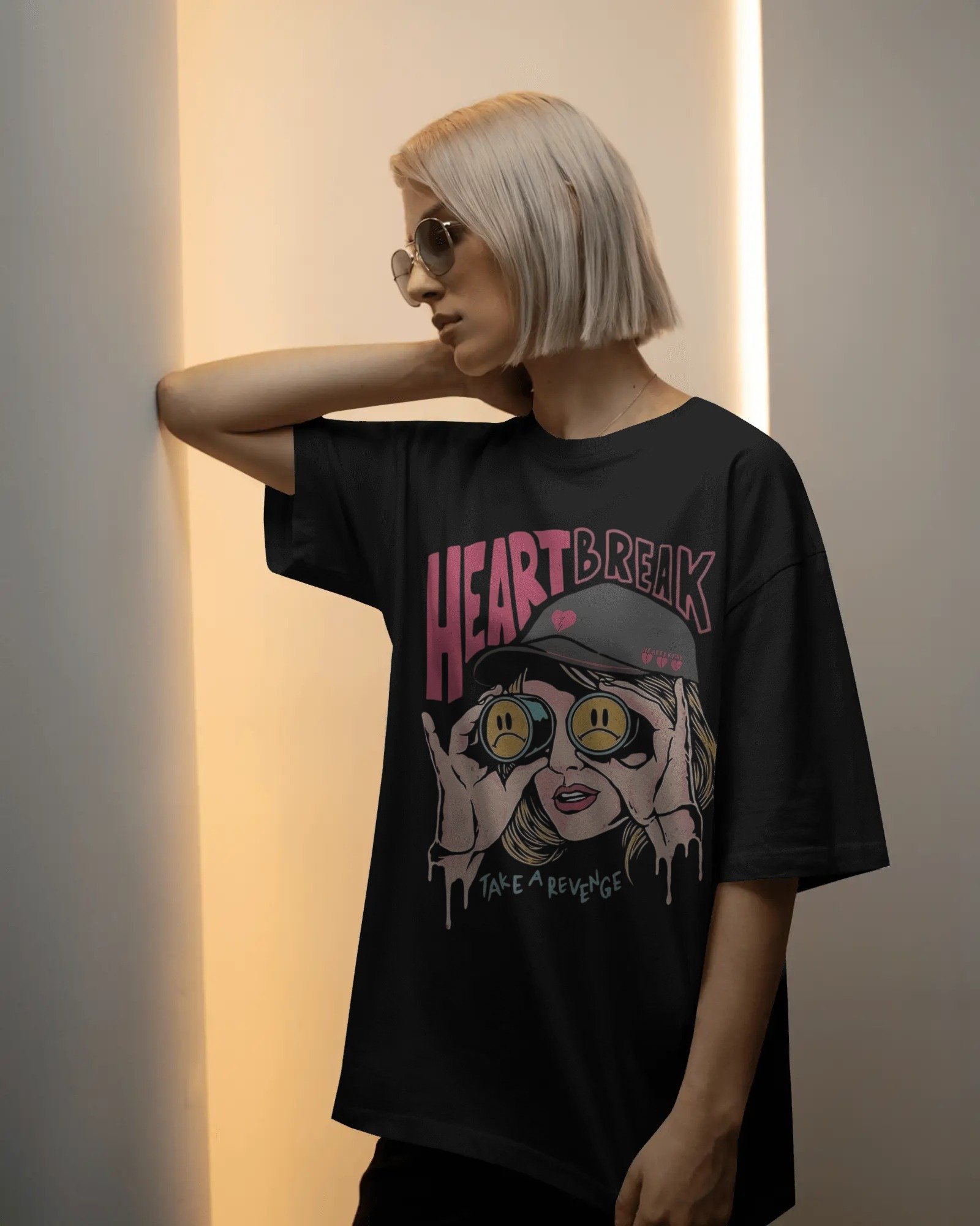 soft-glow-studio-t-shirt-mockup-female-model-with-short-blonde-bob-and-sunglasses-in-minimal-light-01992
