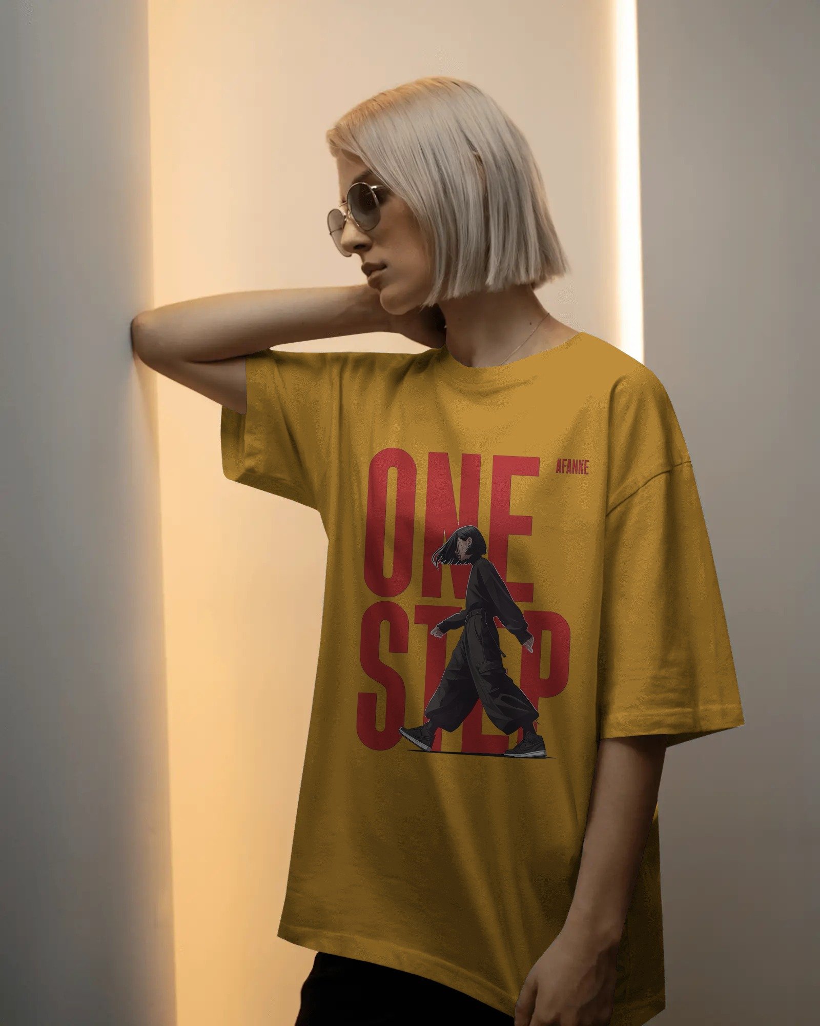 soft-glow-studio-t-shirt-mockup-female-model-with-short-blonde-bob-and-sunglasses-in-minimal-light-01992 (4)